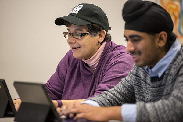 UW President Ana Mari Cauce participates in the Hour of Code